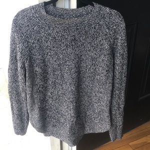 grey sweater with round bottom